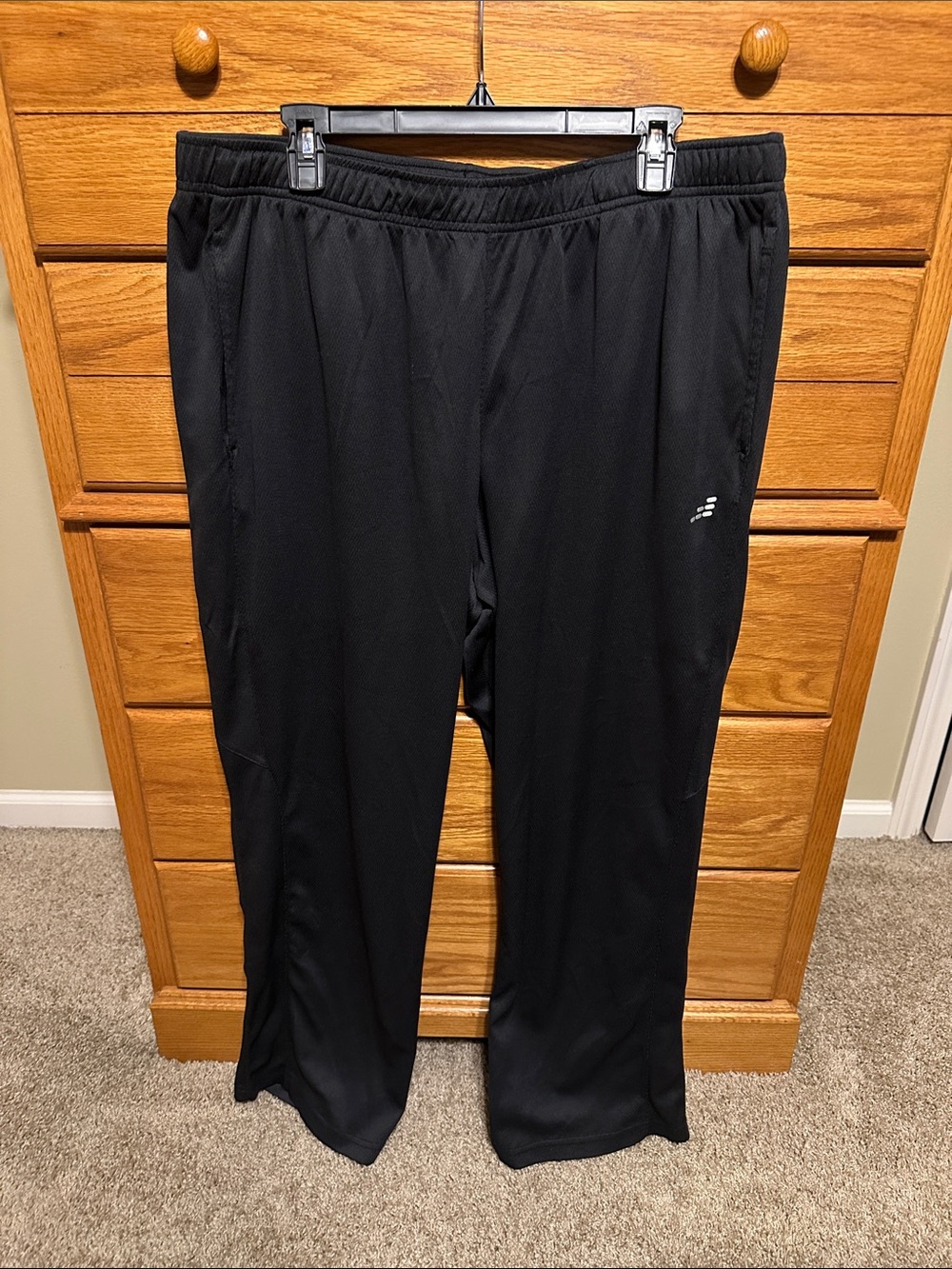 Black Athletic Track Pants with Subtle Logo with draw strings.